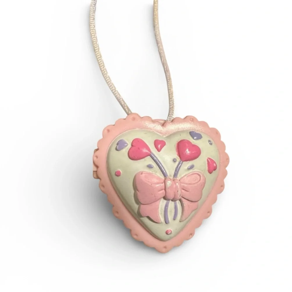 ISO AVON kids pink heart musical locket plays ‘You Are My Sunshine’